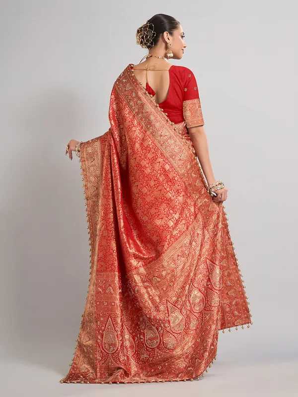 Bridal red kanjivaram silk saree with rich zari detailing