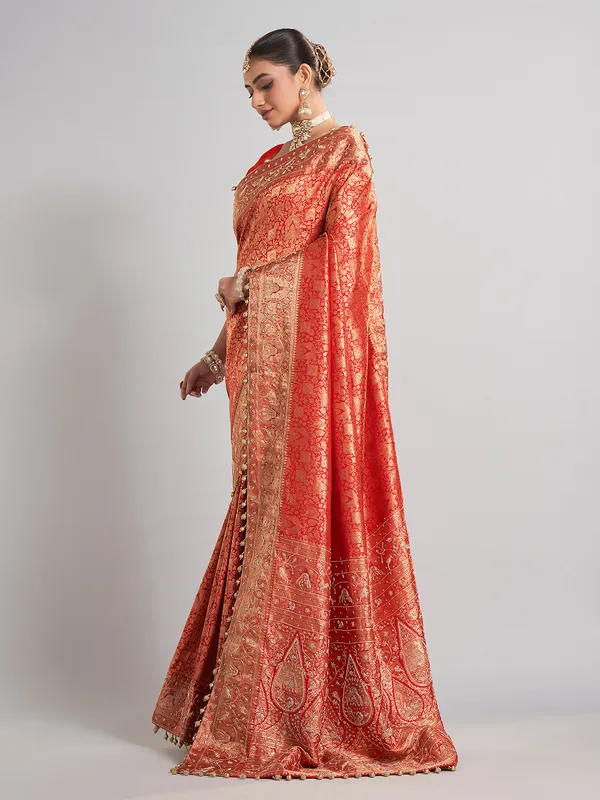 Bridal red kanjivaram silk saree with rich zari detailing