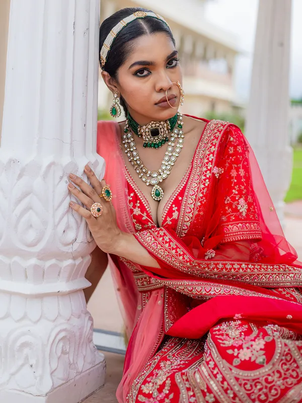 Bridal red silk lehenga choli with rich embellishment