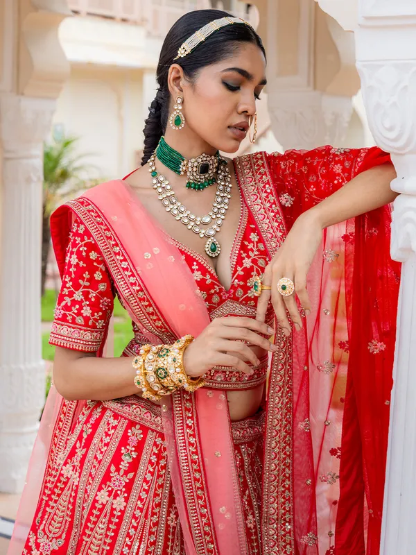 Bridal red silk lehenga choli with rich embellishment