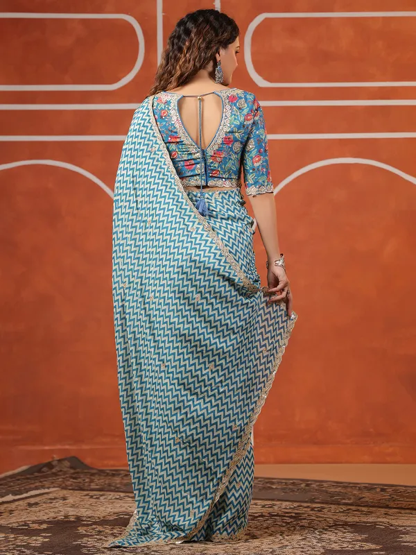 Bright blue printed muslin saree for festive