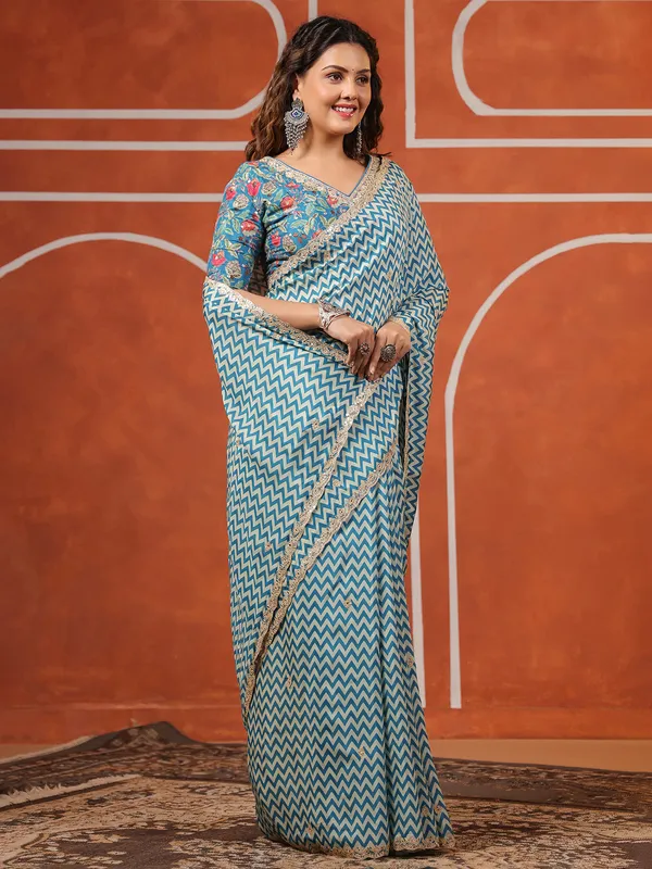Bright blue printed muslin saree for festive