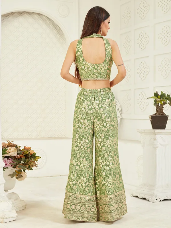 Bright green sleeveless silk palazzo suit with stone work