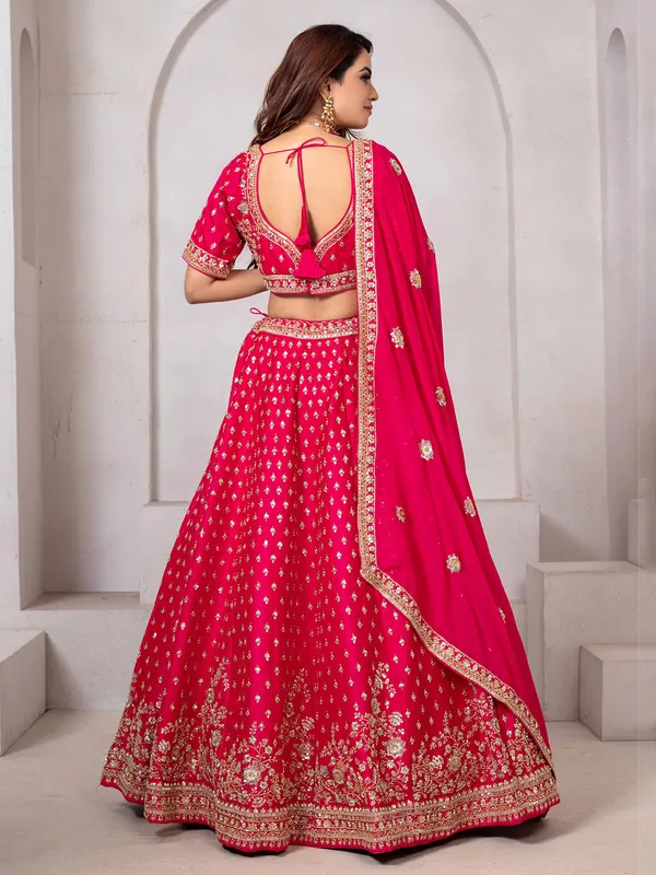 Bright pink beaded raw silk lehenga choli