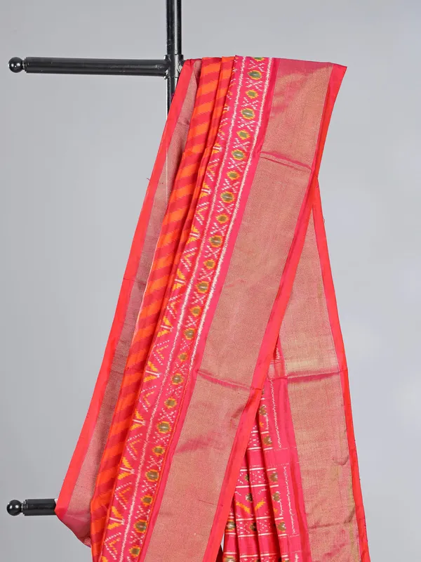 Bright pink printed patola silk saree