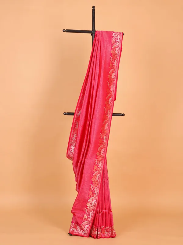 Bright pink silk saree with heavy zari work