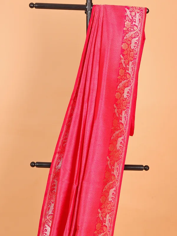 Bright pink silk saree with heavy zari work