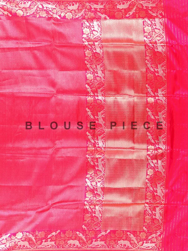 Bright pink silk saree with heavy zari work
