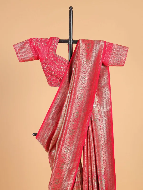 Bright pink silk thread and zari weave saree