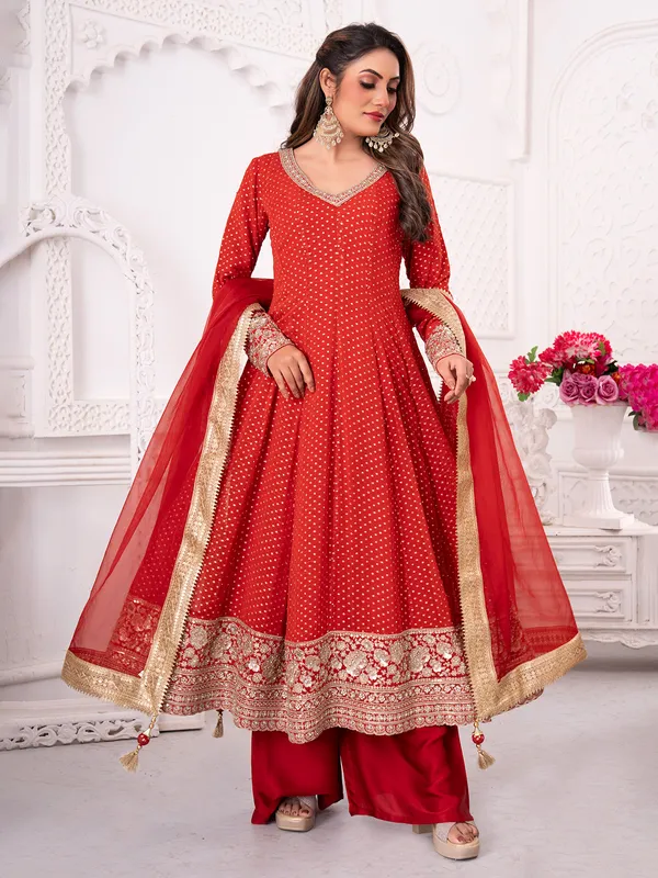 Bright red pakistani georgette palazzo suit with zari work