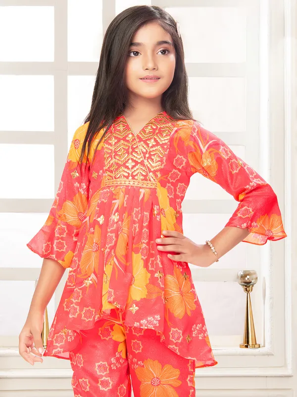 Bright red printed silk salwar suit