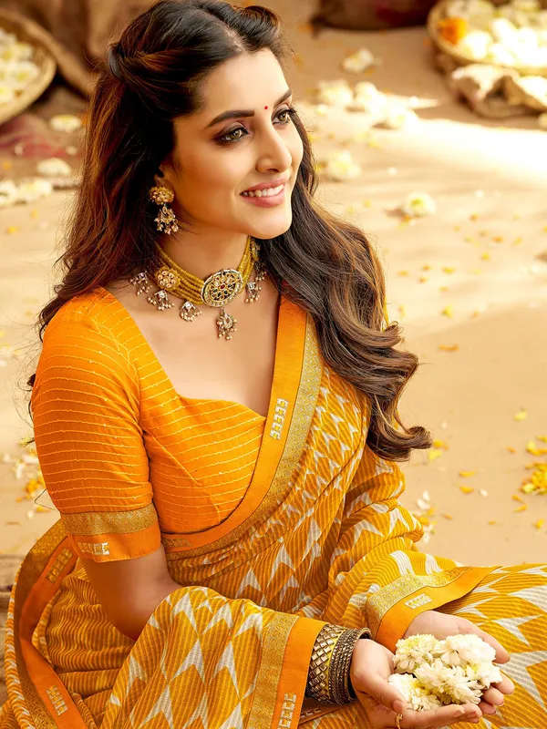 Bright yellow printed saree in georgette