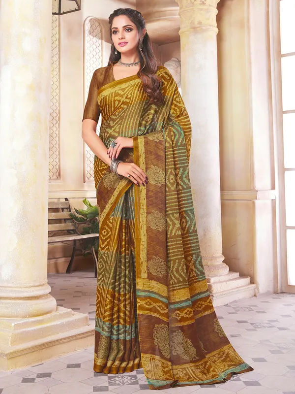Brown and yellow alluring festive wear saree in crepe