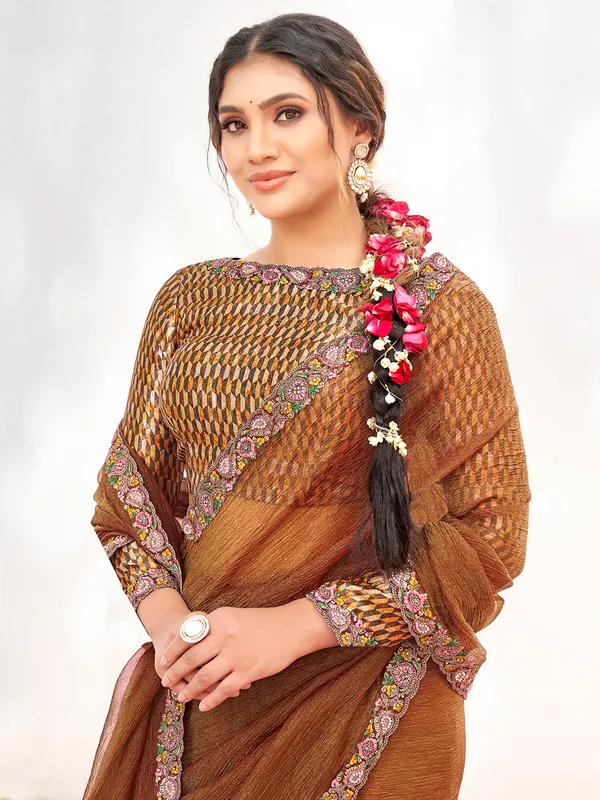 Brown crepe saree with subtle bead embroidery work