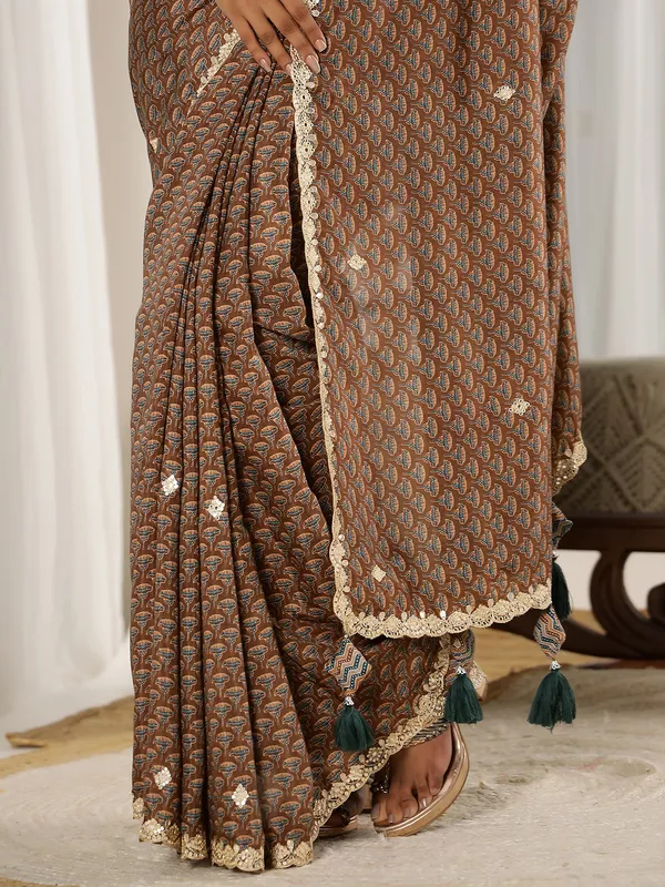 Brown muslin saree with ready made blouse