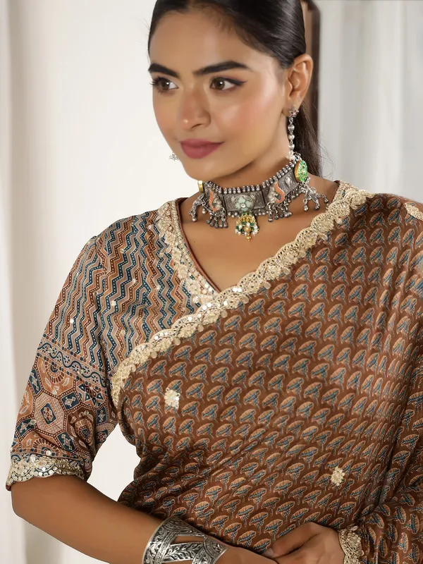 Brown muslin saree with ready made blouse