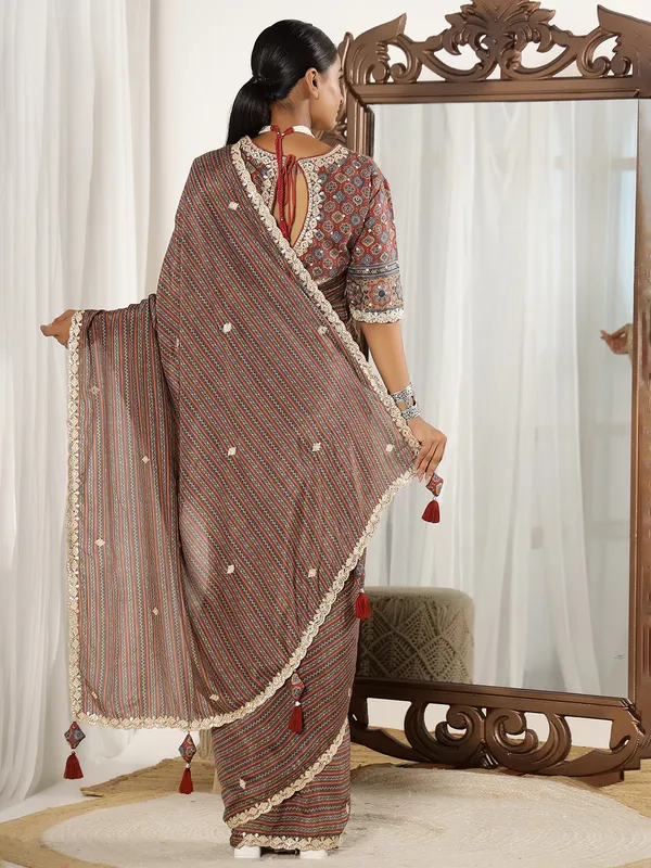 Brown printed festive style muslin saree