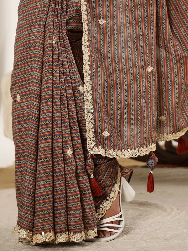 Brown printed festive style muslin saree
