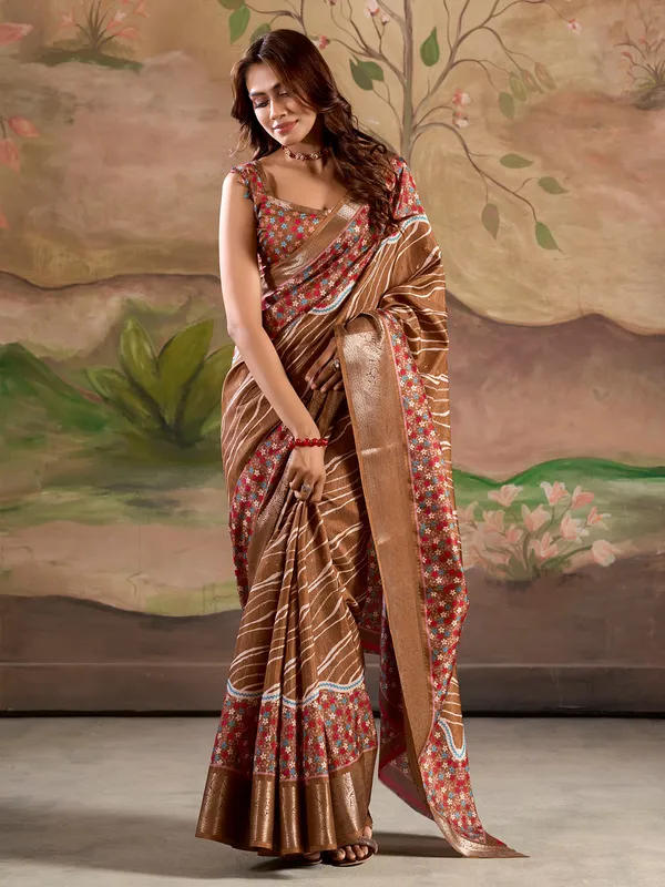 Brown printed silk saree with zari detailing