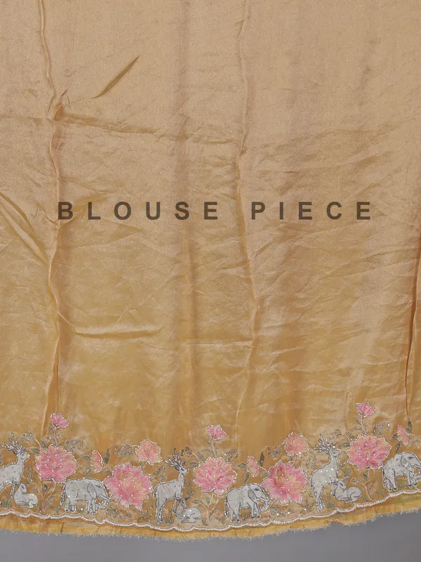 Brown tissue silk saree with elephant embroidered charm