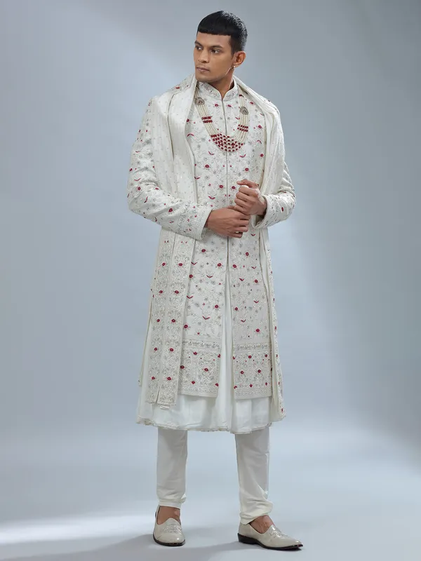 Catchy white raw silk peshwai sherwani