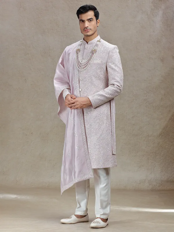 Charming pink silk sherwani with ornated dupatta