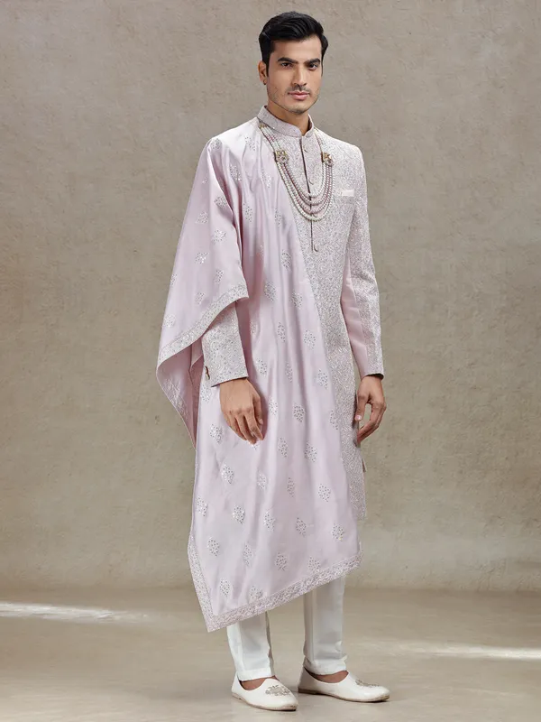 Charming pink silk sherwani with ornated dupatta