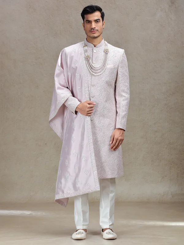 Charming pink silk sherwani with ornated dupatta