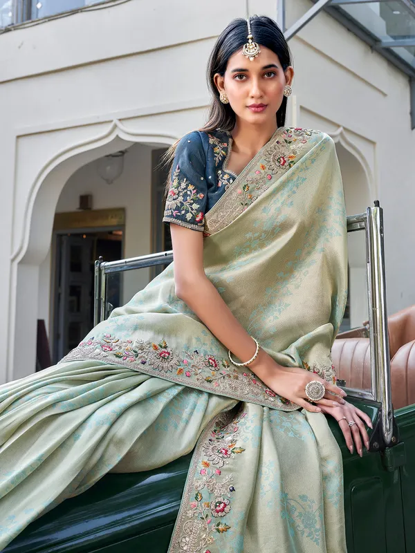 Claay pista green tissue silk saree