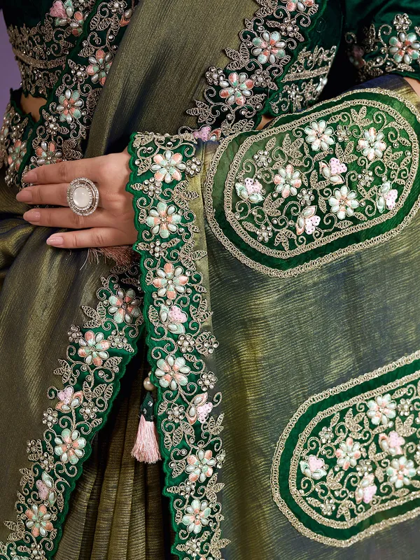 Classy green tissue silk saree for wedding
