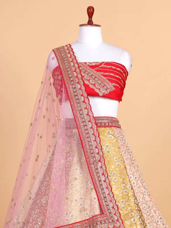 Coral red silk based wedding style lehenga choli