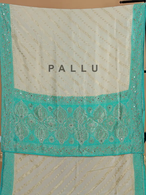 Cream and aqua dola silk wedding wear saree