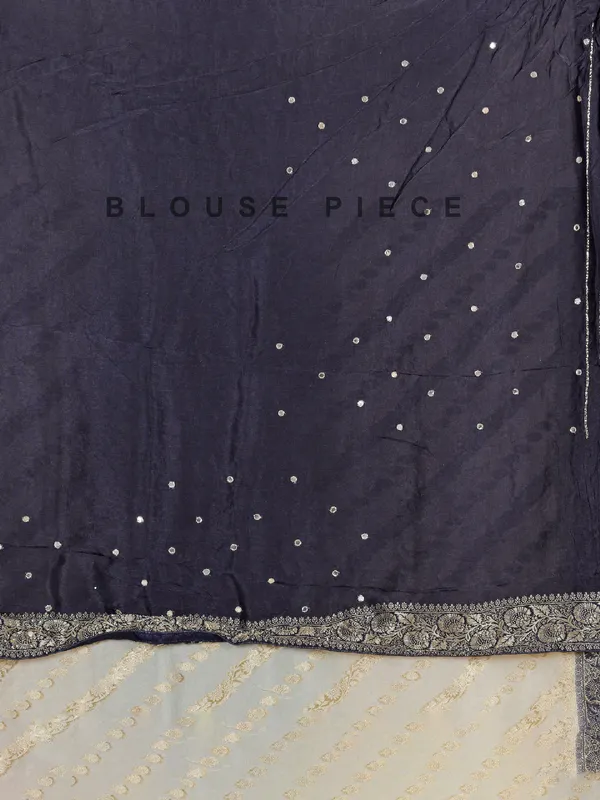 Cream and blue dola silk saree with zari weaving
