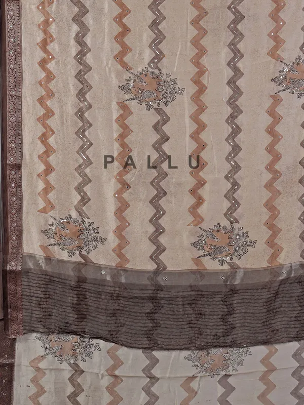 Cream and brown cotton silk saree with zigzag accents