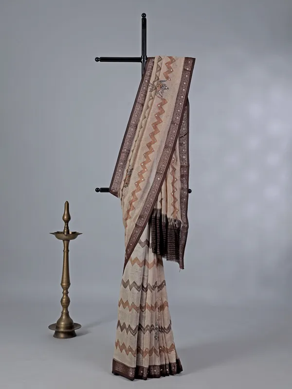 Cream and brown cotton silk saree with zigzag accents
