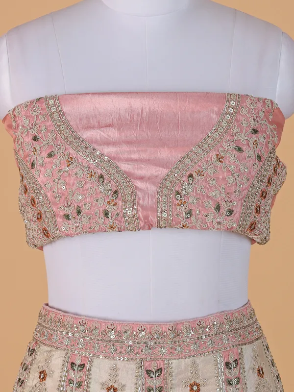 Cream and peach raw silk lehenga choli