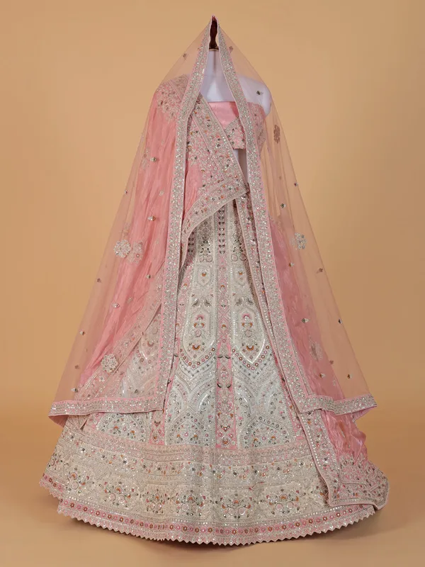 Cream and peach raw silk lehenga choli