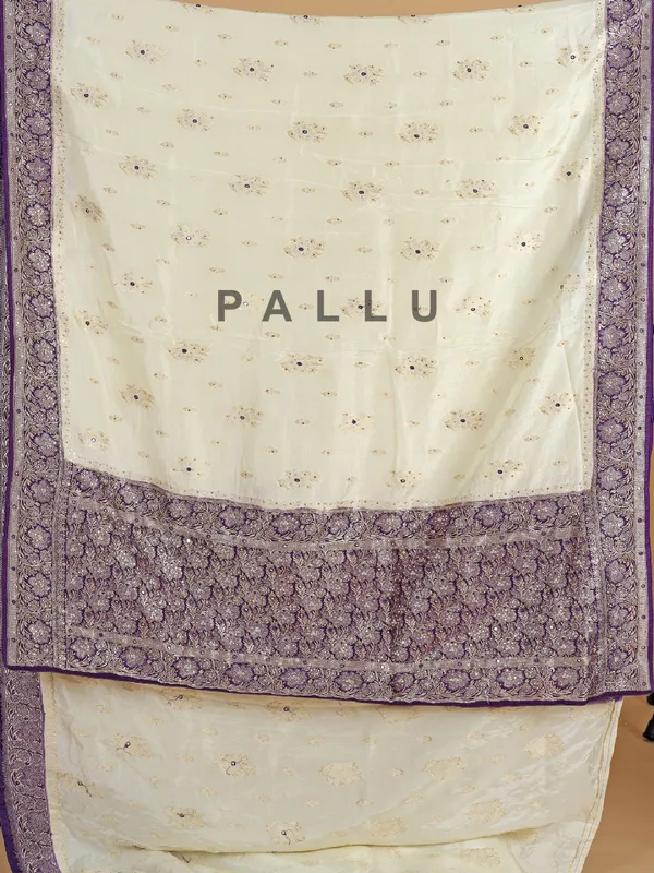 Cream and purple dola silk saree with zari work