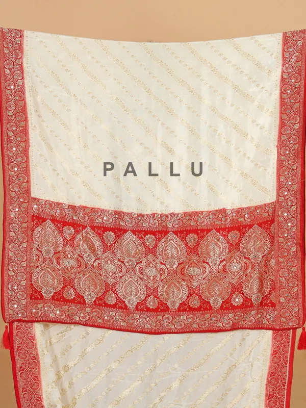 Cream and red saree for wedding wear