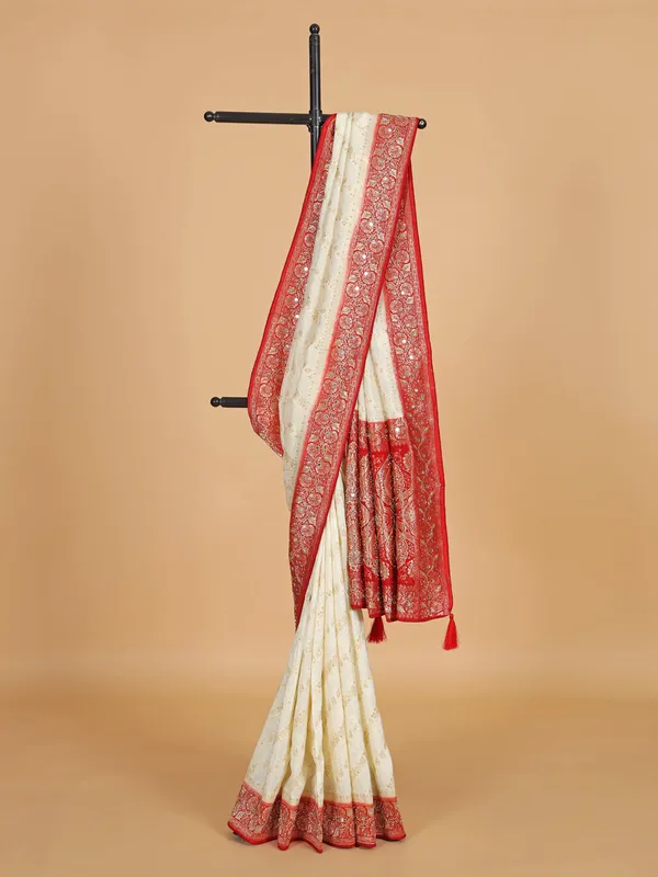 Cream and red saree for wedding wear