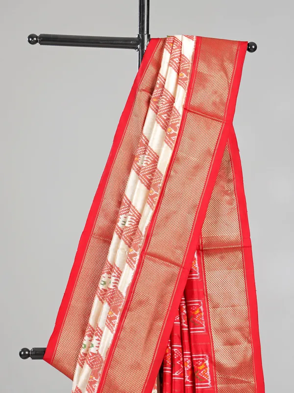 Cream and red zari weaving patola silk saree for festive