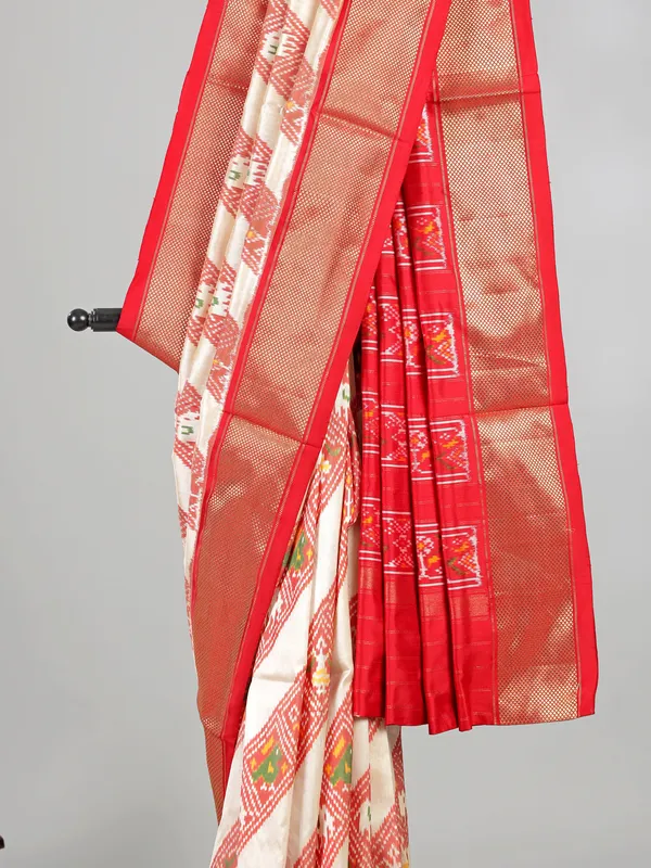 Cream and red zari weaving patola silk saree for festive