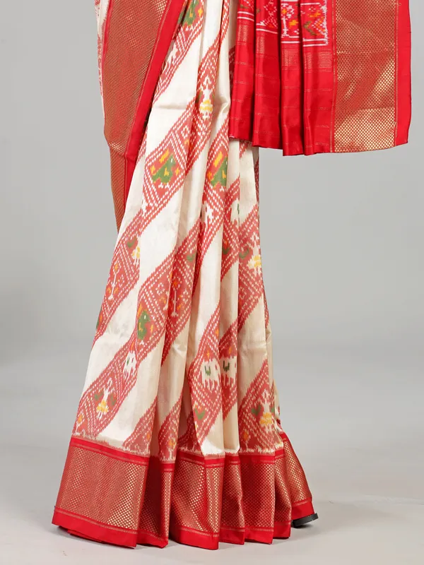 Cream and red zari weaving patola silk saree for festive
