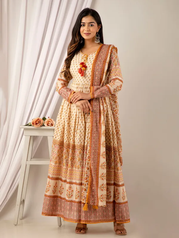 Cream and yellow printed cotton long kurti