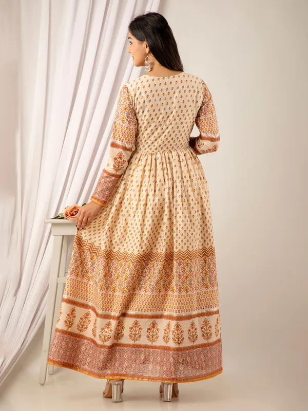 Cream and yellow printed cotton long kurti