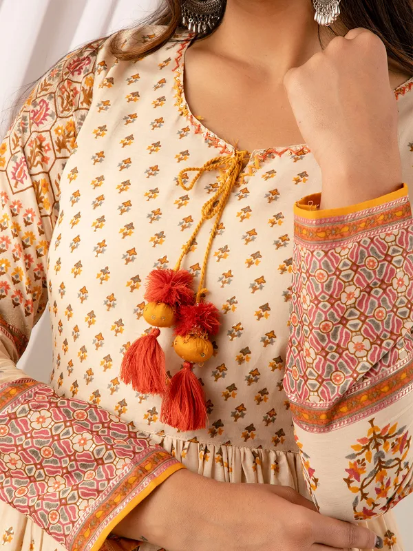 Cream and yellow printed cotton long kurti