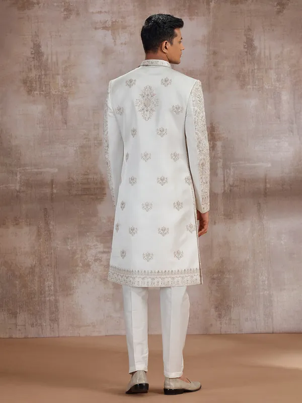 Cream art silk wedding sherwani for groom