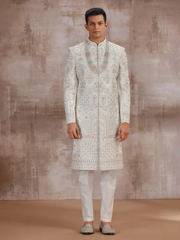 Cream art silk wedding sherwani for groom