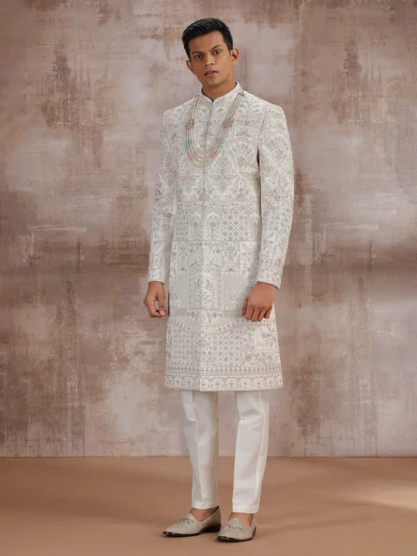 Cream art silk wedding sherwani for groom