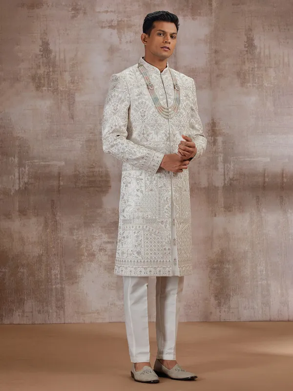 Cream art silk wedding sherwani for groom